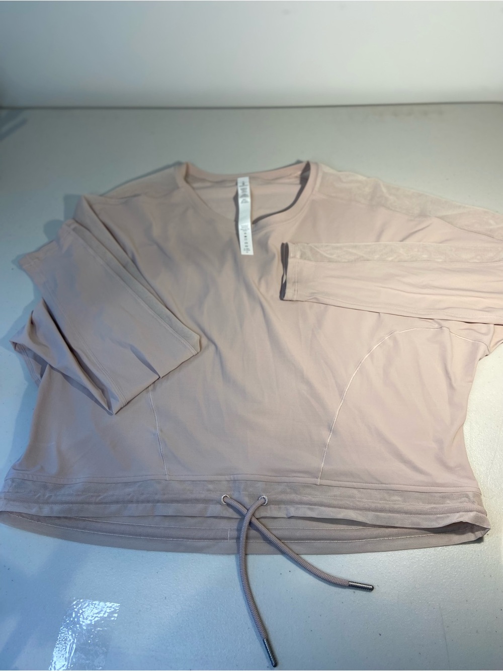 lululemon athletica Light Blush Long-Sleeve Drawstring Top